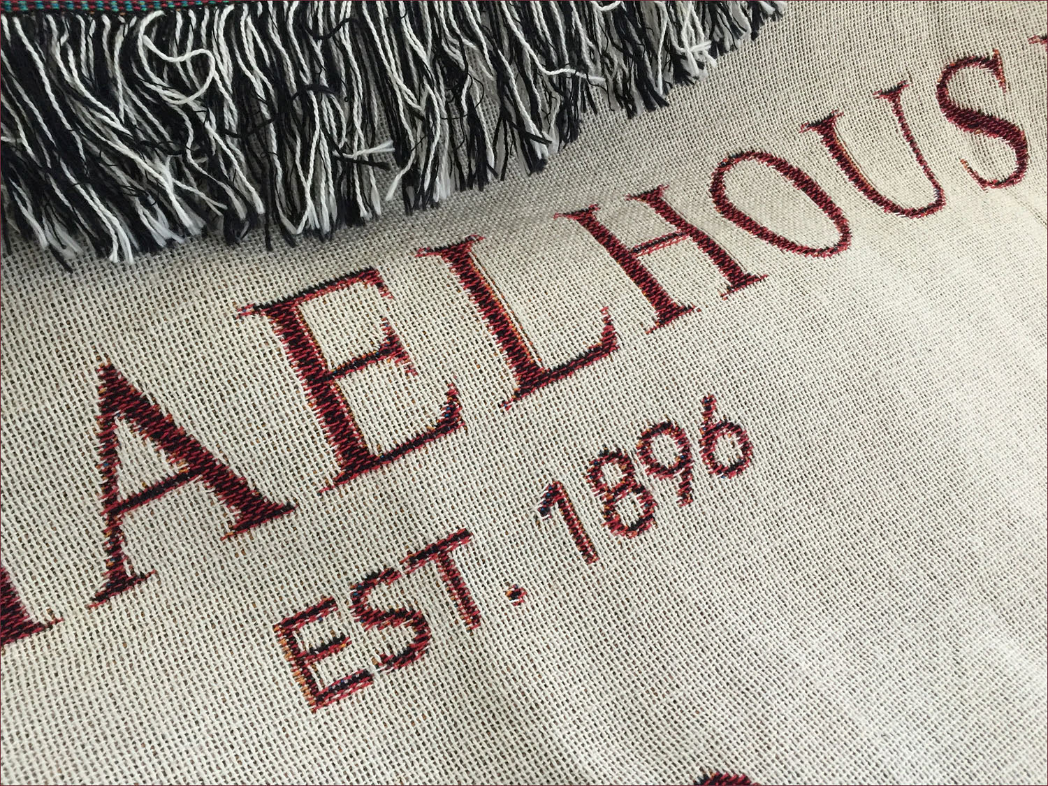 Couverture tissée personnalisée avec l'emblème de l'école Michaelhouse